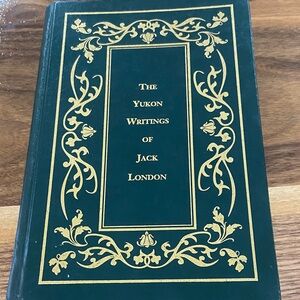 Green and Gold Decorative cover of “The Yukon Writingss of Jack London”